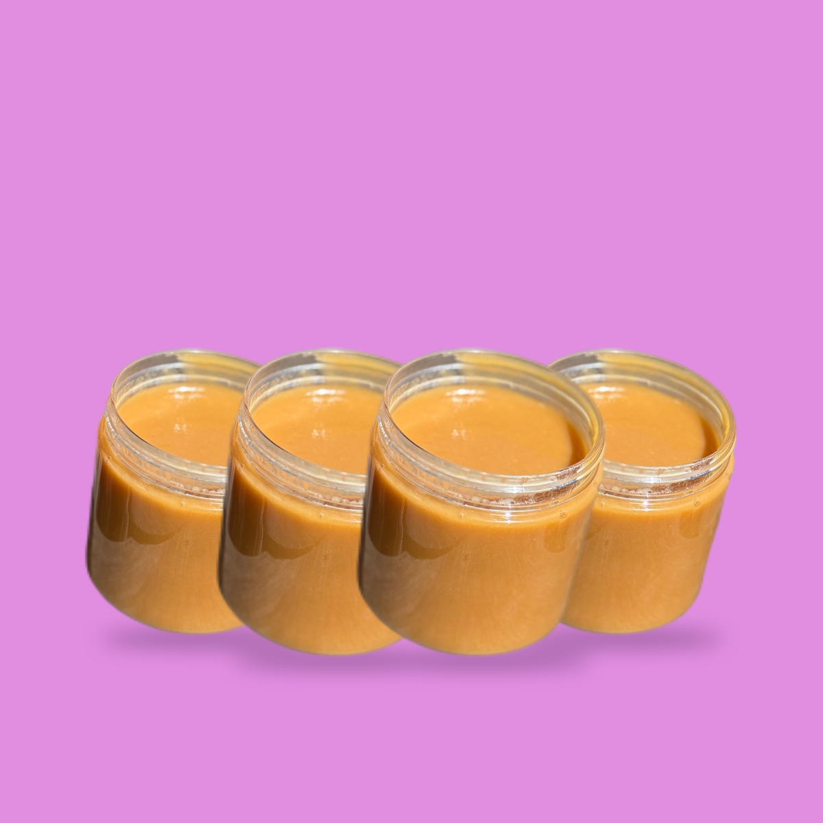 Four jars of Mama Row's caramel sauce together