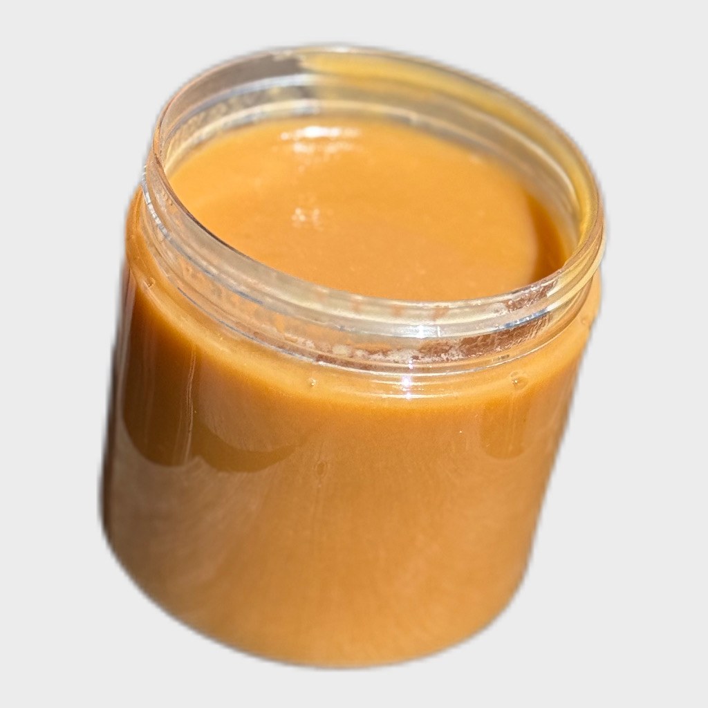 A 4 oz jar of Mama Row's Caramel, It's Da Sauce